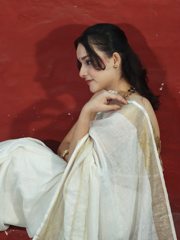 Banarasee Handloom Pure Linen Saree With Gold Zari Border-White
