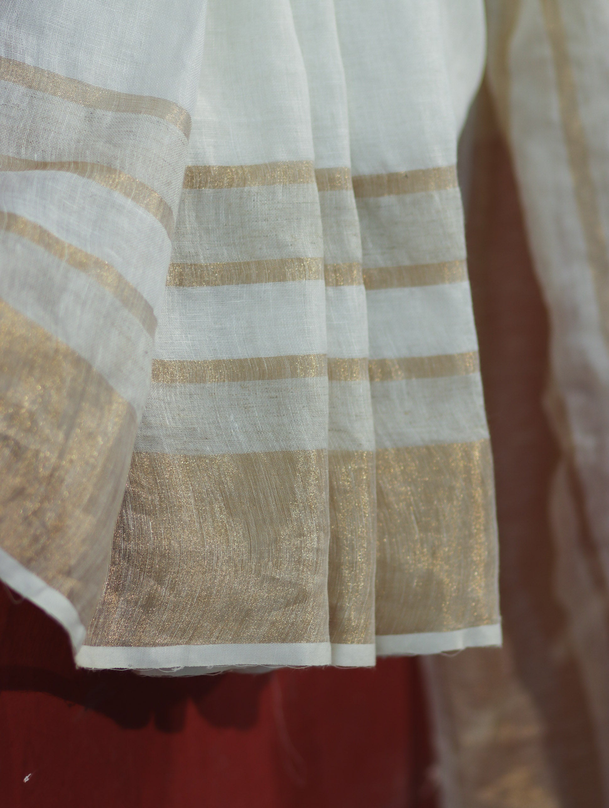 Banarasee Handloom Pure Linen Saree With Gold Zari Border-White