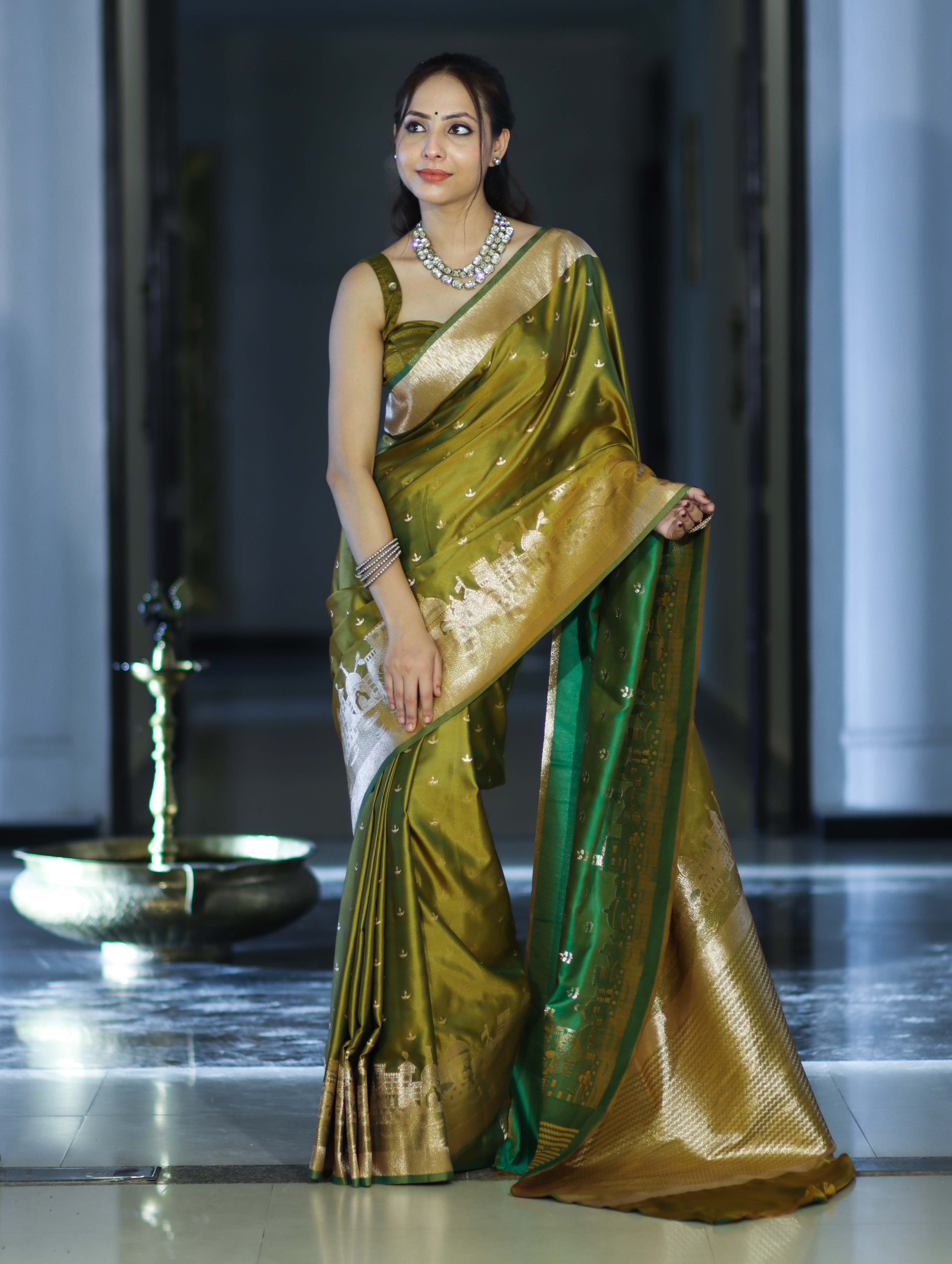 Banarasee Handloom Soft Silk Saree With Diya Design & Ganga Ghat Zari Border-Olive Green (Yellow Tone)