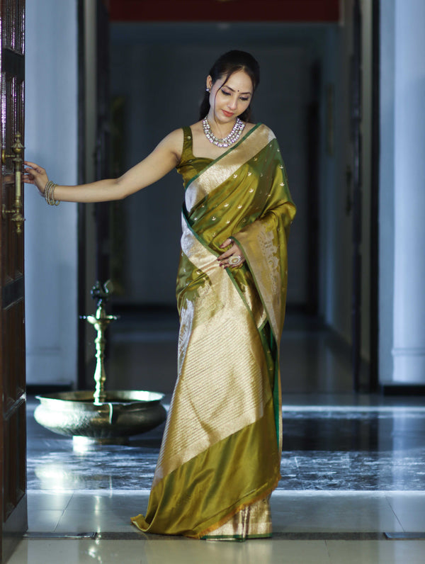 Banarasee Handloom Soft Silk Saree With Diya Design & Ganga Ghat Zari Border-Olive Green (Yellow Tone)