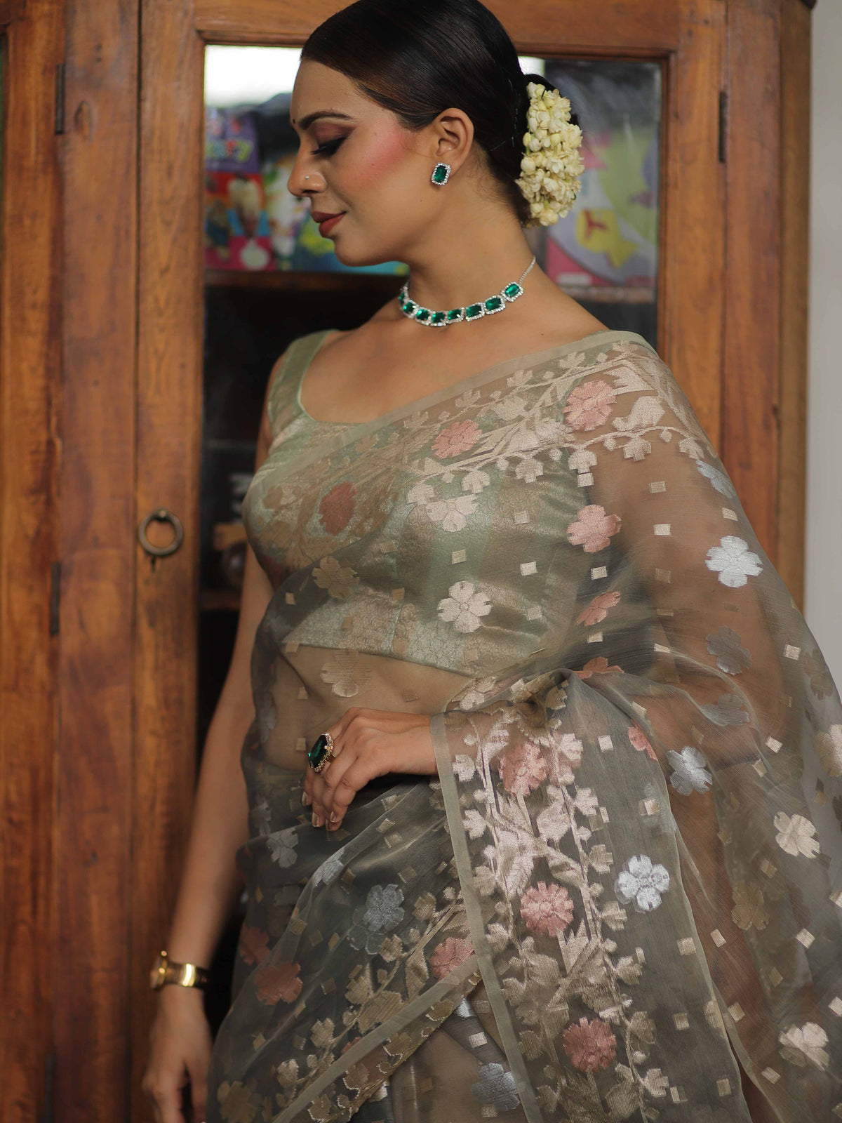 Dark Green Muslin Jamdani Saree with Zari buttis main image 0
