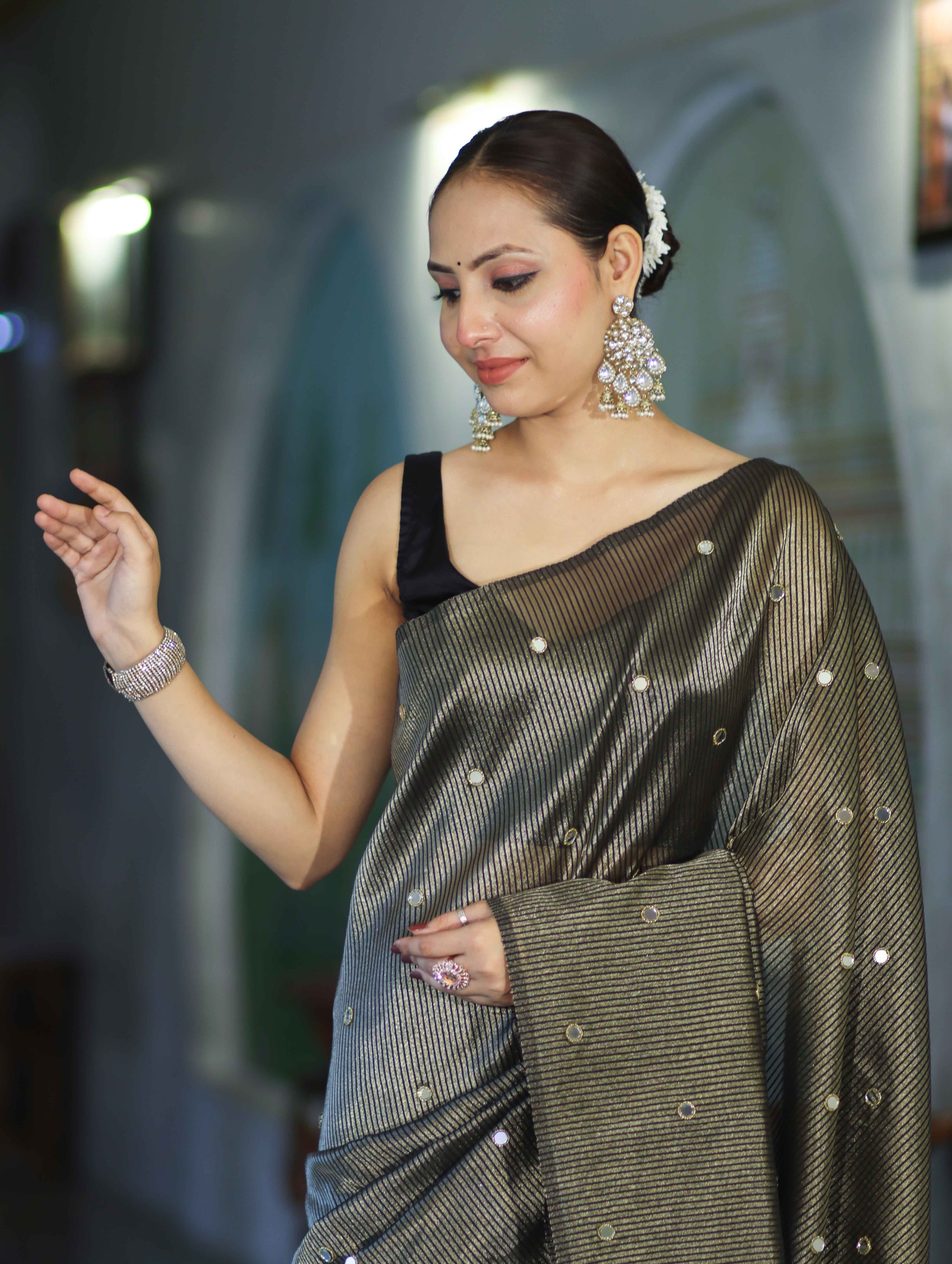 Banarasee Soft Tissue Saree With Hand Embroidered Mirror Work & Zari Stripes Design-Black