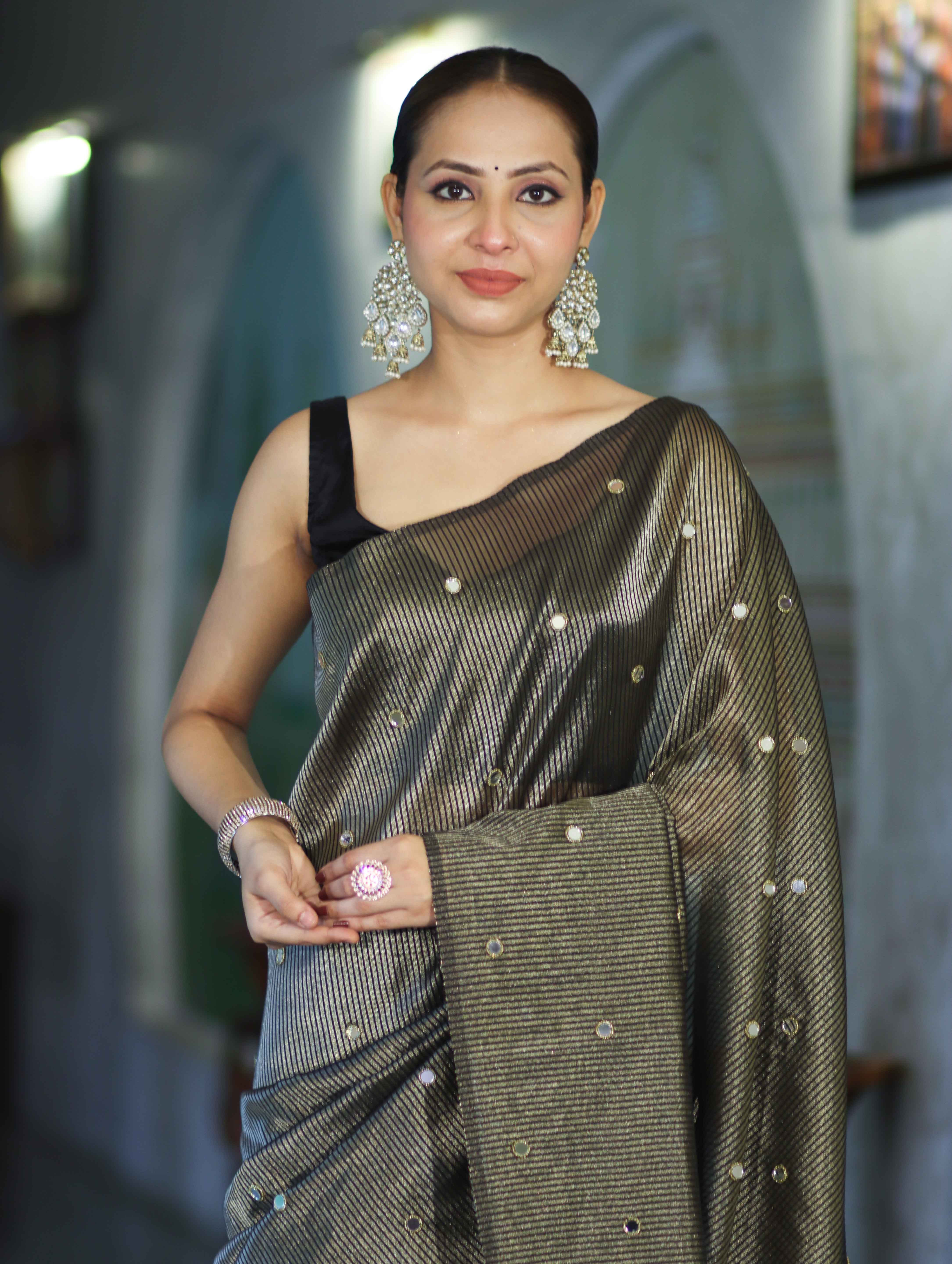 Banarasee Soft Tissue Saree With Hand Embroidered Mirror Work & Zari Stripes Design-Black