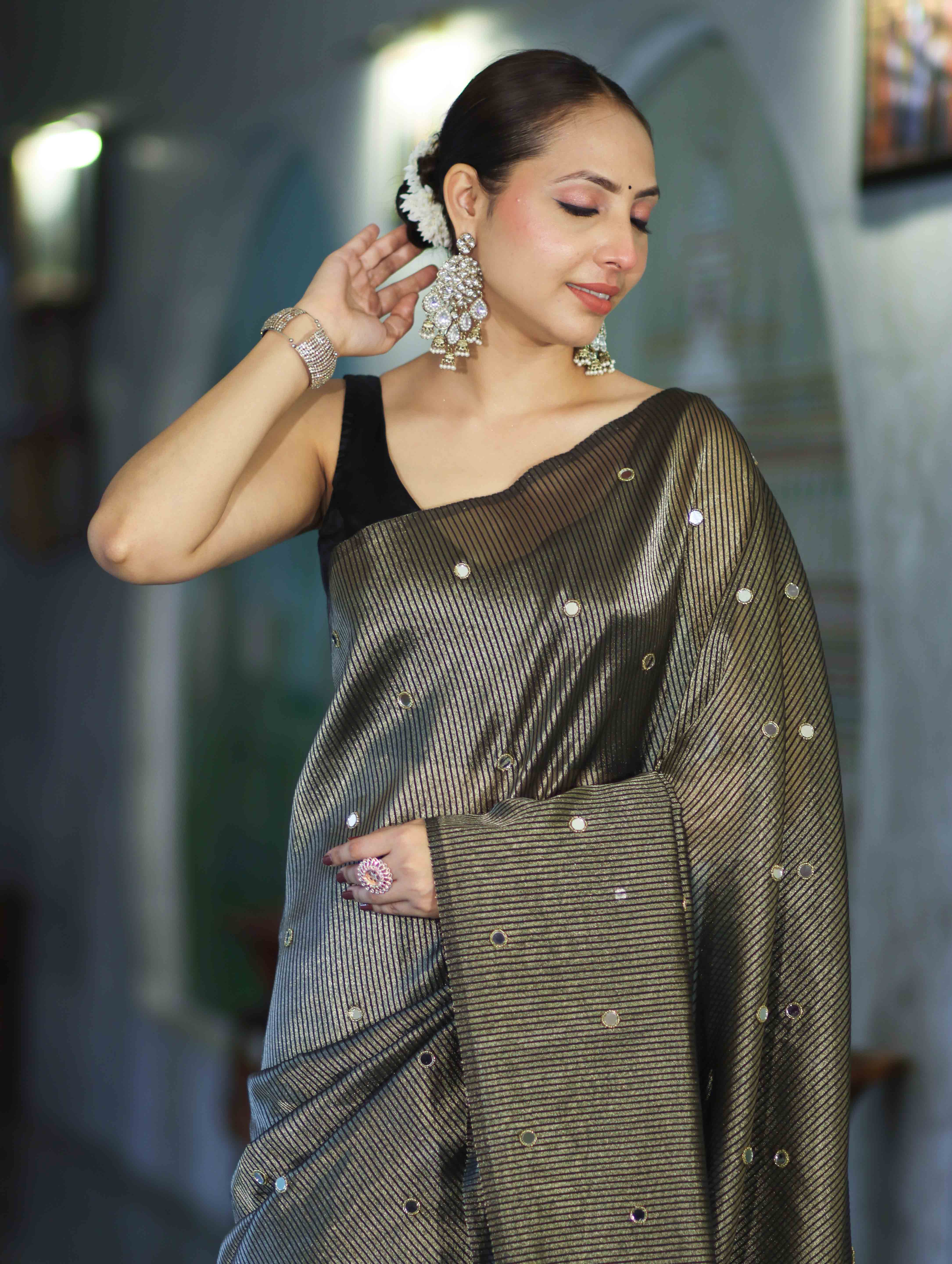 Banarasee Soft Tissue Saree With Hand Embroidered Mirror Work & Zari Stripes Design-Black