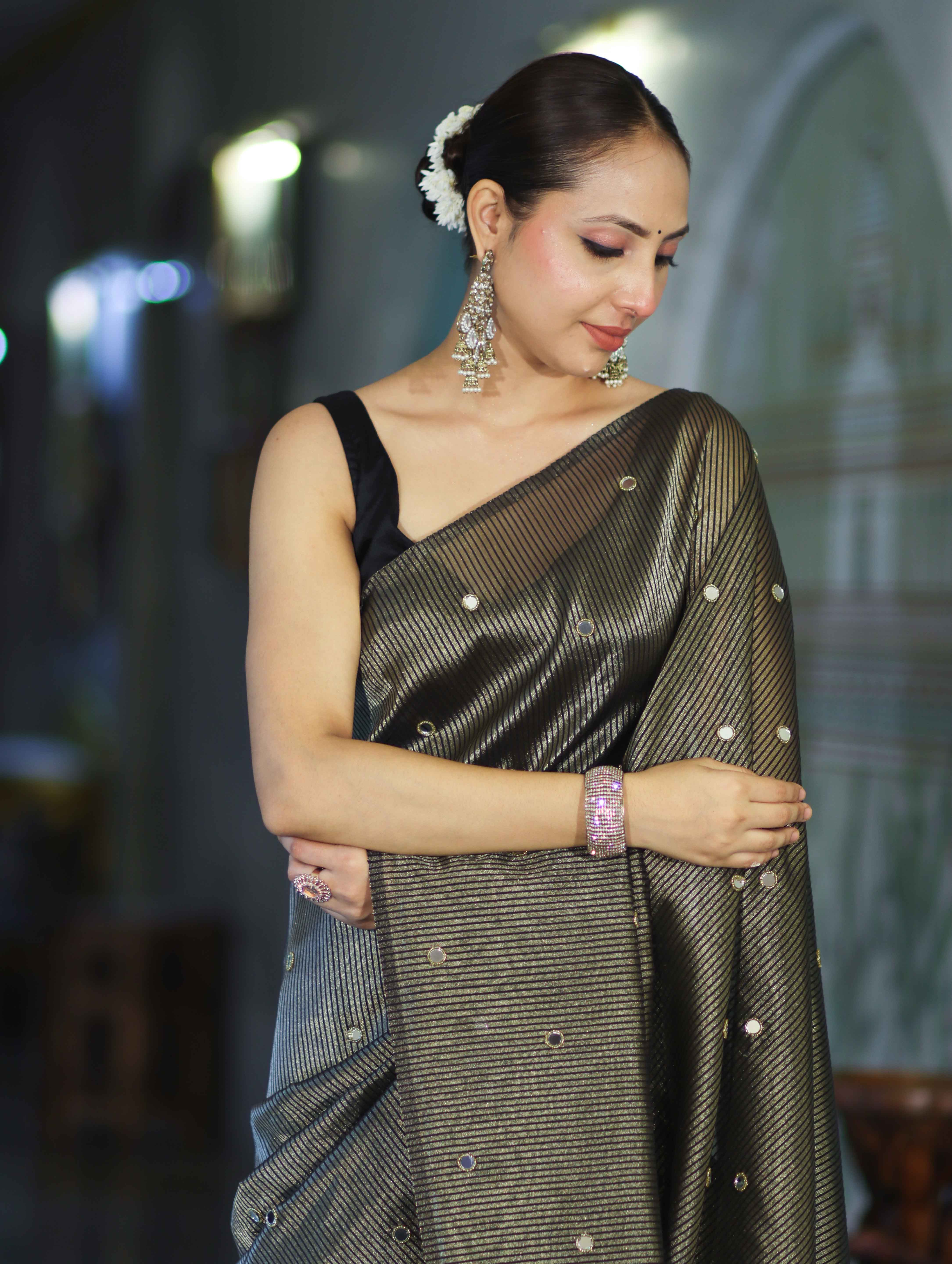 Banarasee Soft Tissue Saree With Hand Embroidered Mirror Work & Zari Stripes Design-Black