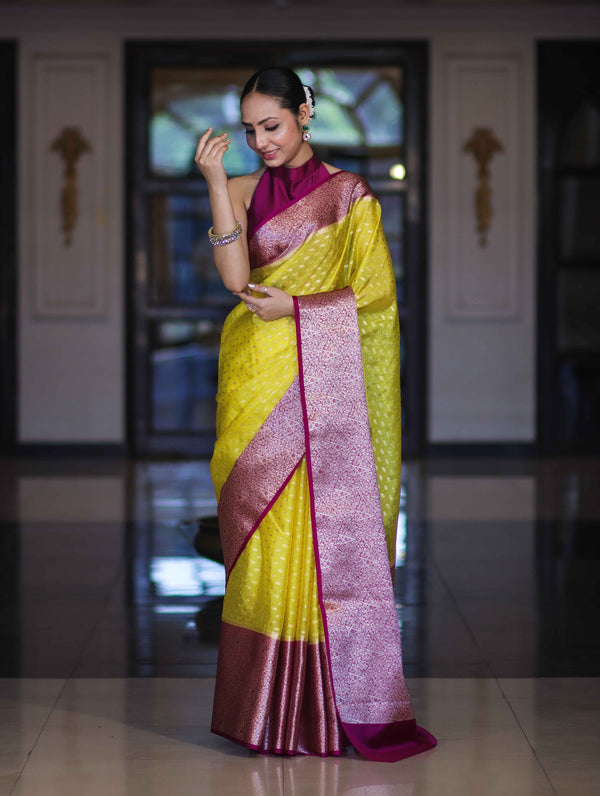 Banarasee Semi Chiffon Saree With Buti Design & Contrast Zari Border-Yellow & Magenta