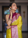 Banarasee Semi Chiffon Saree With Buti Design & Contrast Zari Border-Yellow & Magenta