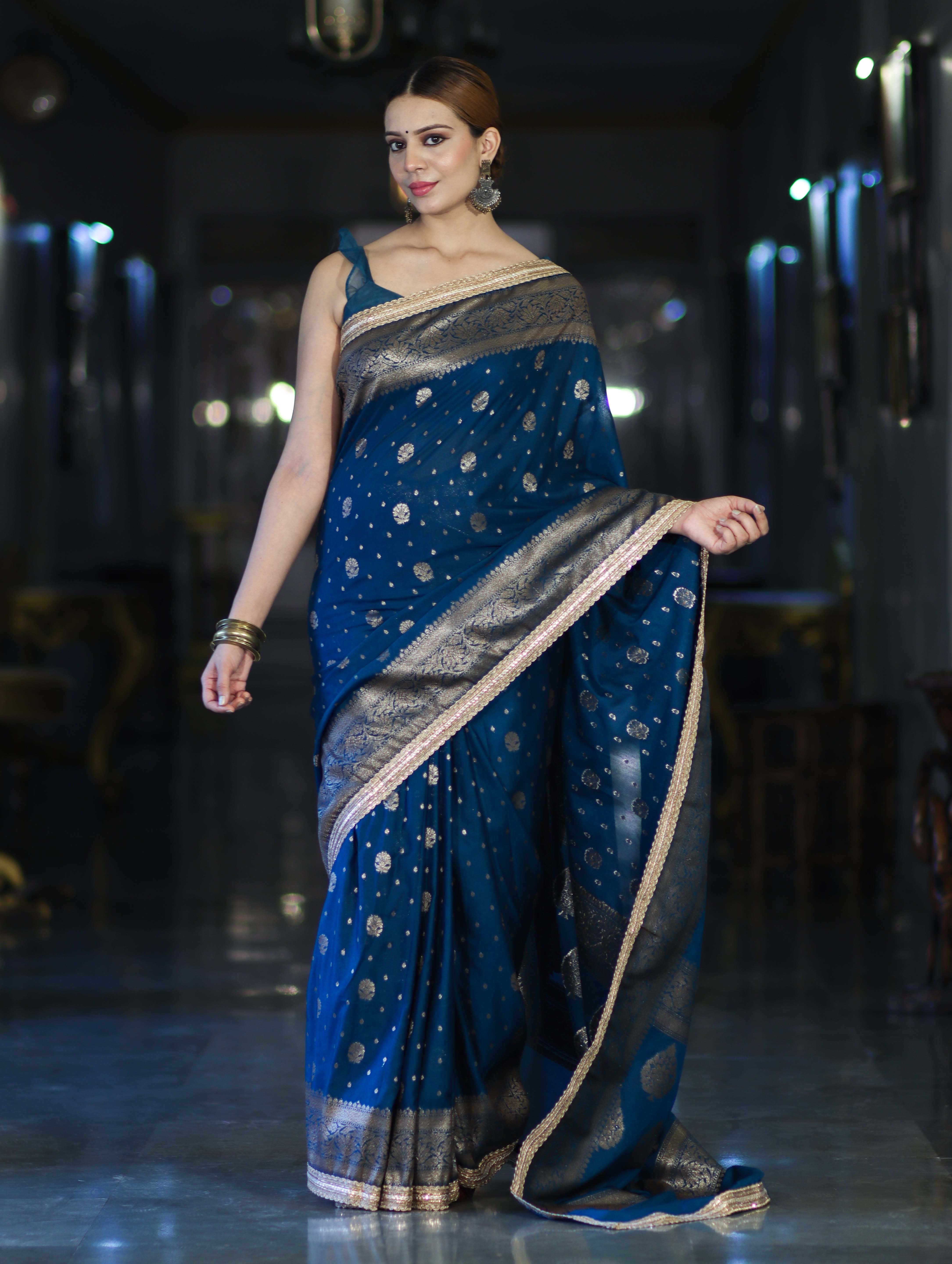 Banarasee Handwoven Faux Georgette Saree With Antique Zari Work Floral Border & Lace-Teal Blue