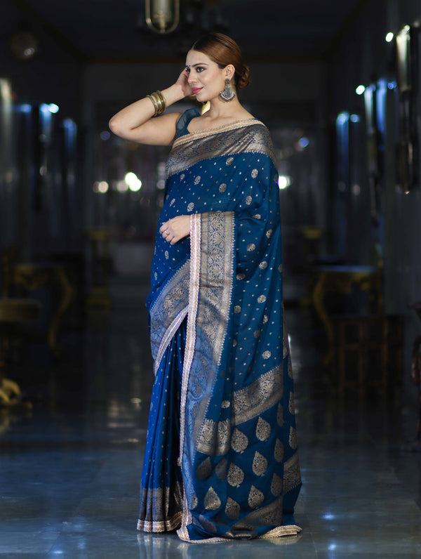 Banarasee Handwoven Faux Georgette Saree With Antique Zari Work Floral Border & Lace-Teal Blue