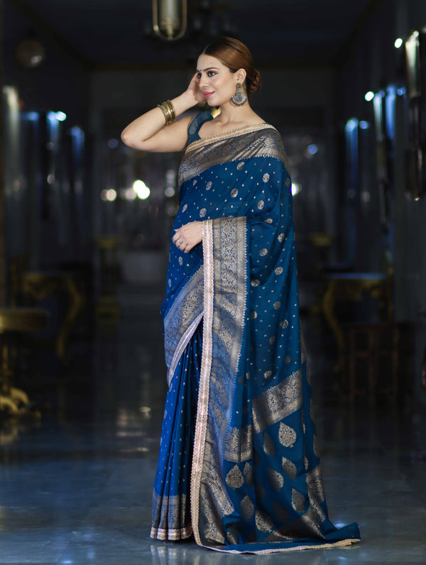 Banarasee Handwoven Faux Georgette Saree With Antique Zari Work Floral Border & Lace-Teal Blue