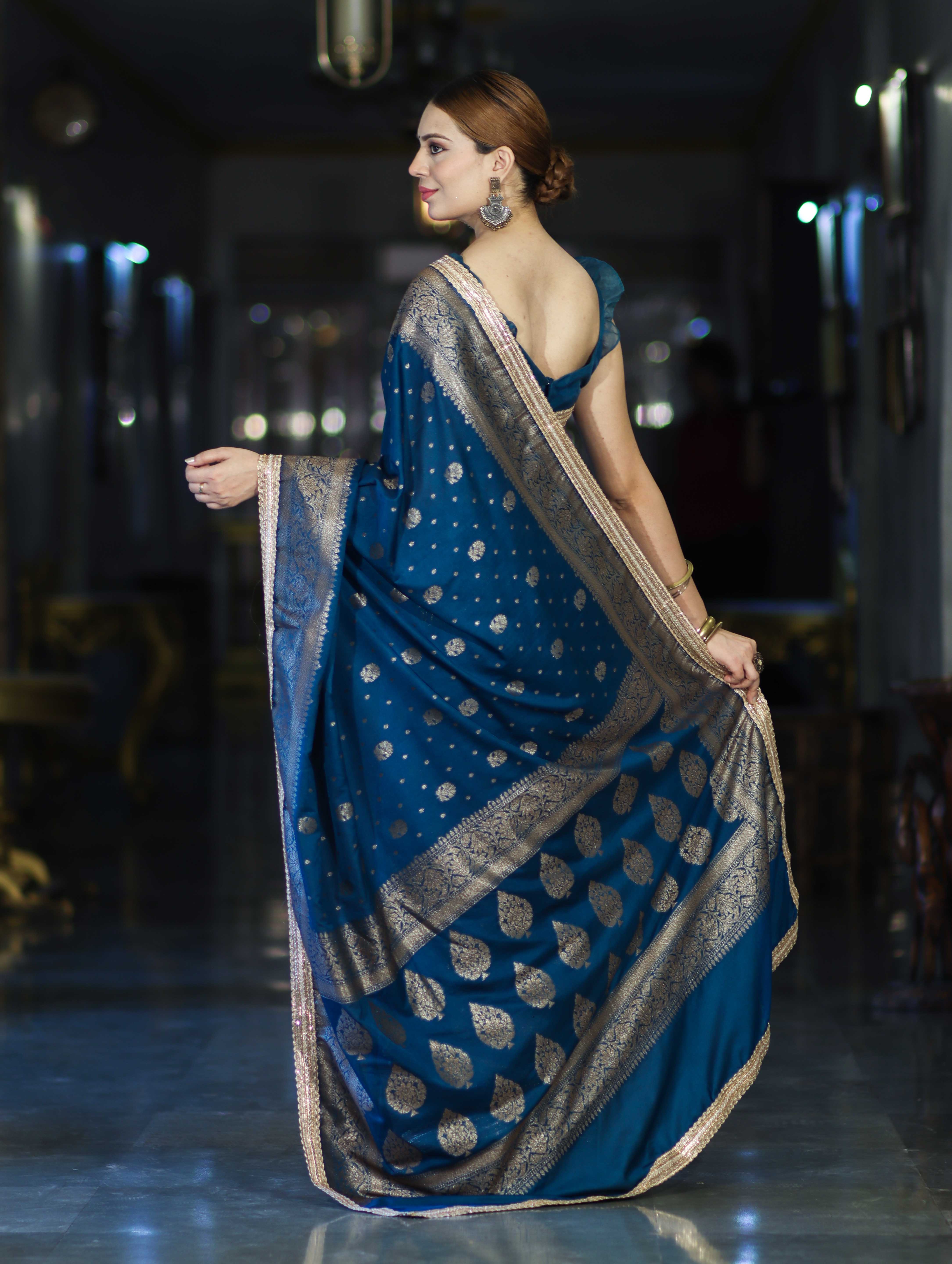 Banarasee Handwoven Faux Georgette Saree With Antique Zari Work Floral Border & Lace-Teal Blue