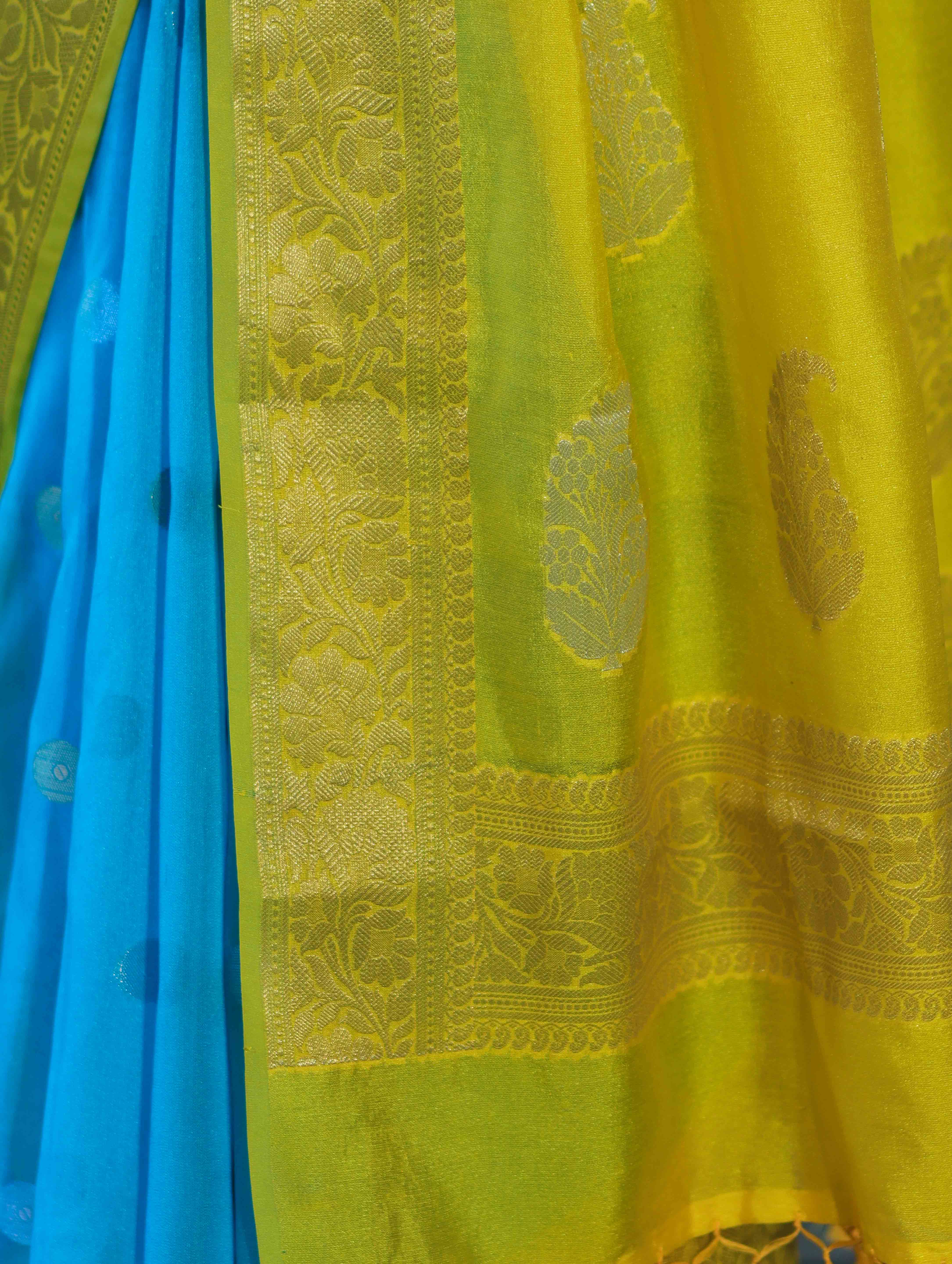 Banarasee Semi Chiffon Saree With Zari Buti Design & Contrast Border-Sky Blue & Yellow