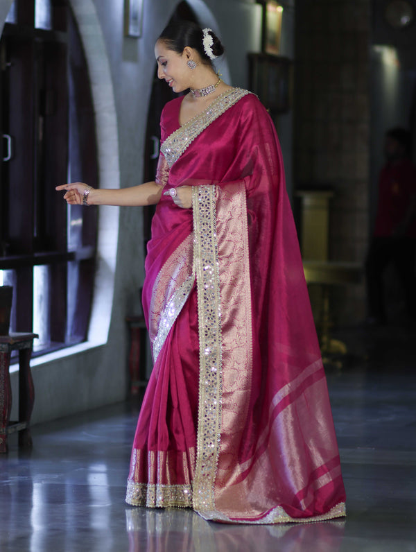 Banarasee Handwoven Tissue Saree With Floral Zari Border & Mirror Work Lace–Magenta
