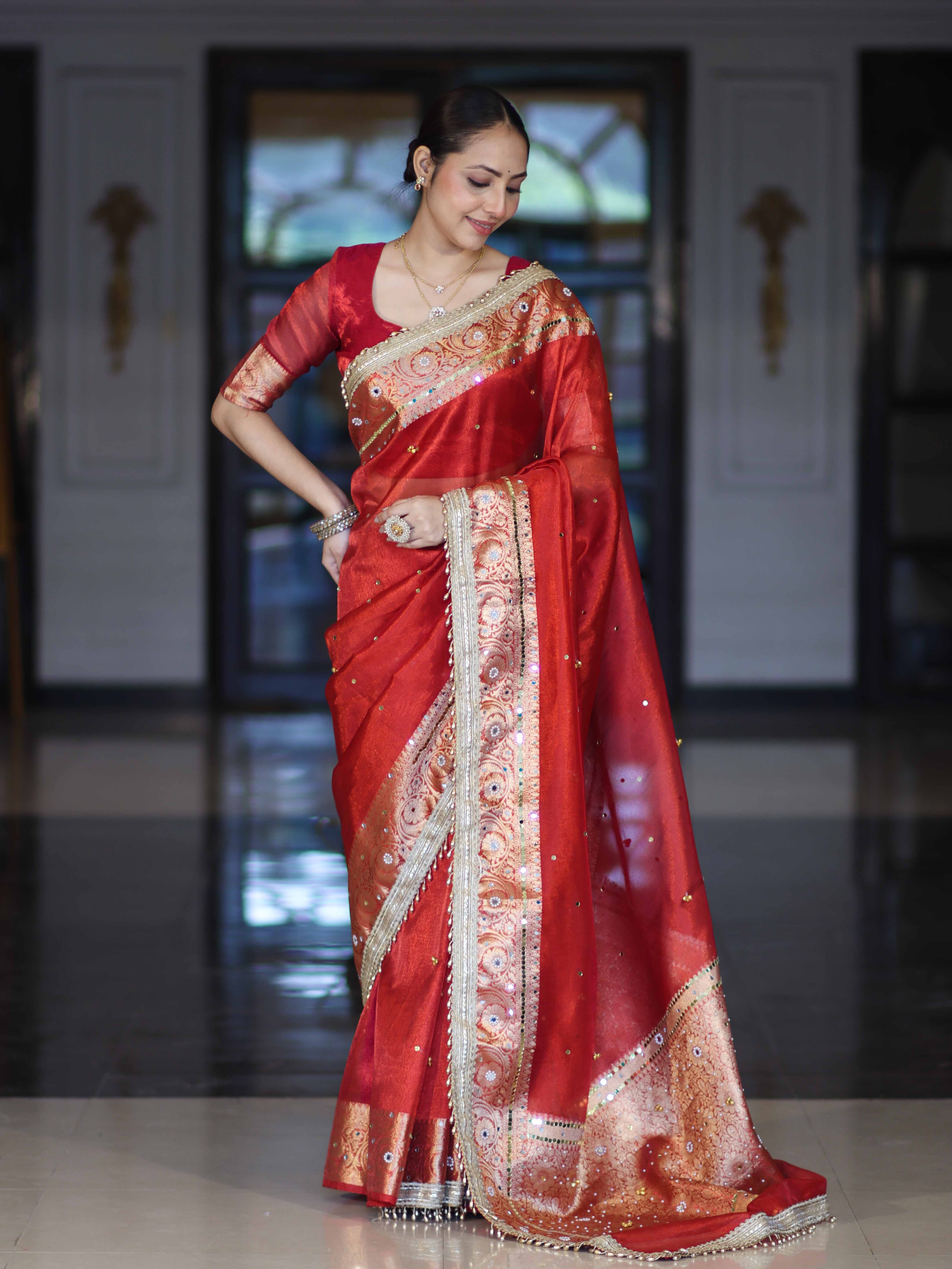 Banarasee Tissue Saree With Hand Embroidered Mirror Work Ghungroo Work & Zari Woven Pallu-Red