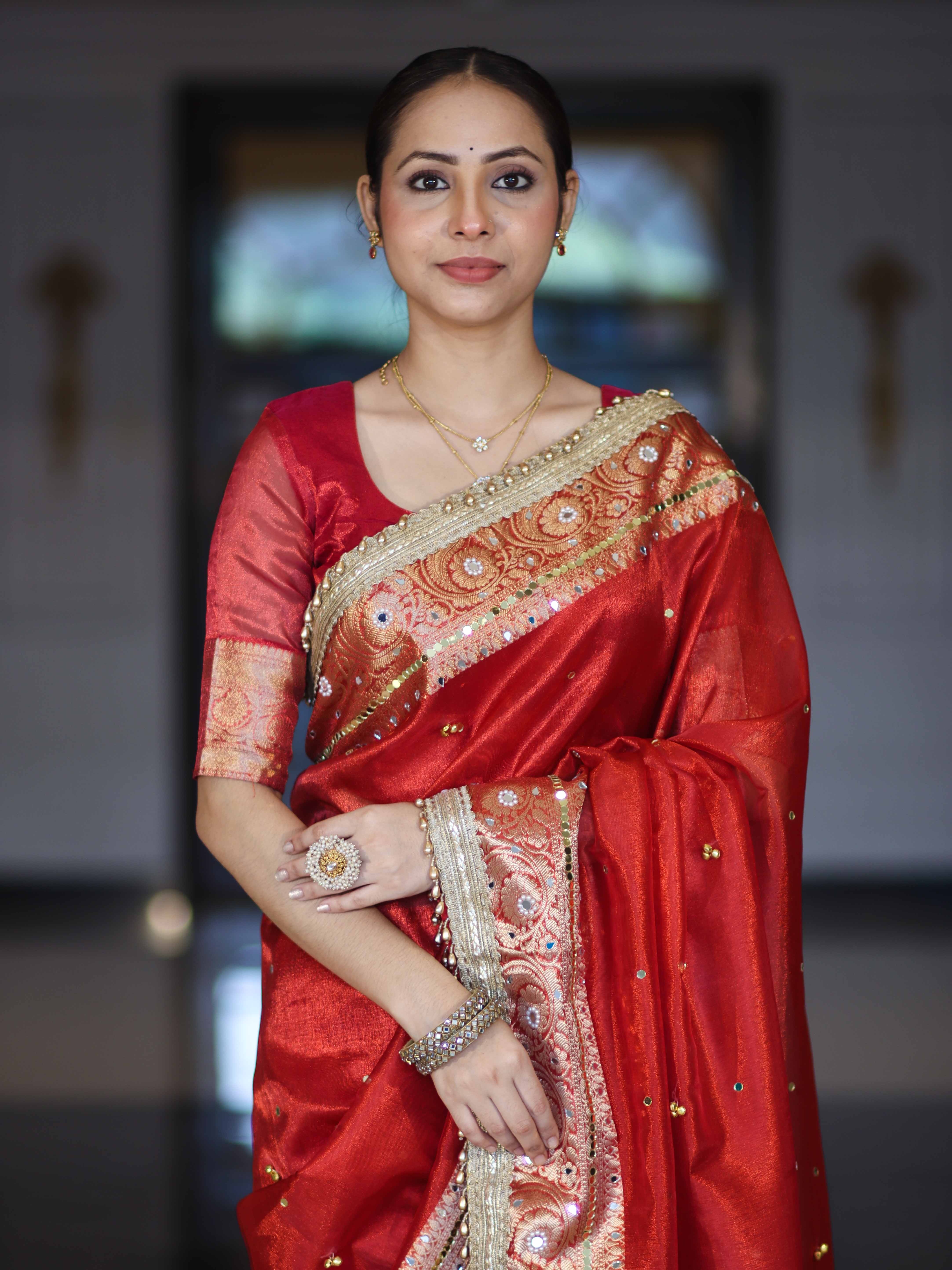 Banarasee Tissue Saree With Hand Embroidered Mirror Work Ghungroo Work & Zari Woven Pallu-Red