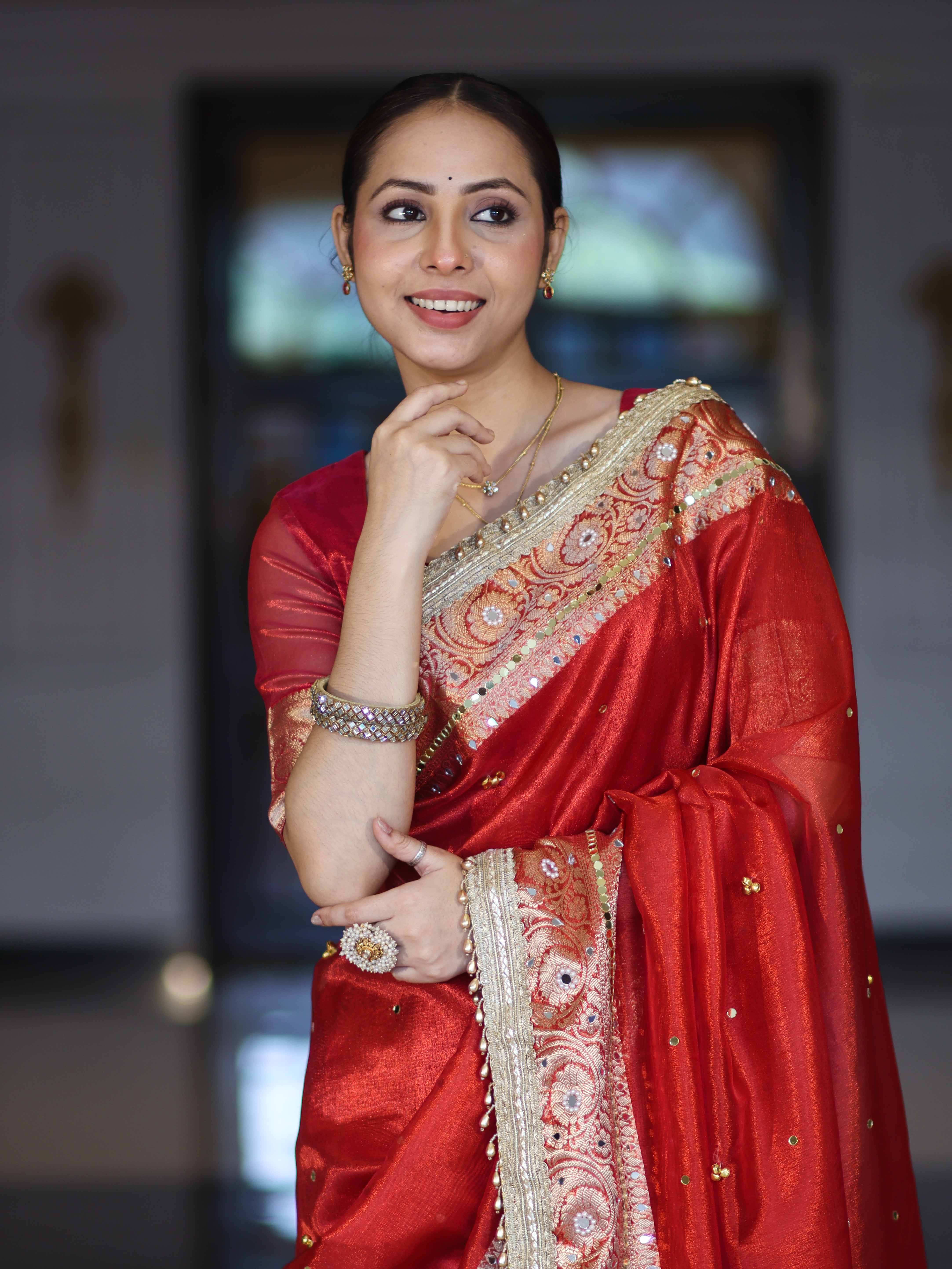 Banarasee Tissue Saree With Hand Embroidered Mirror Work Ghungroo Work & Zari Woven Pallu-Red