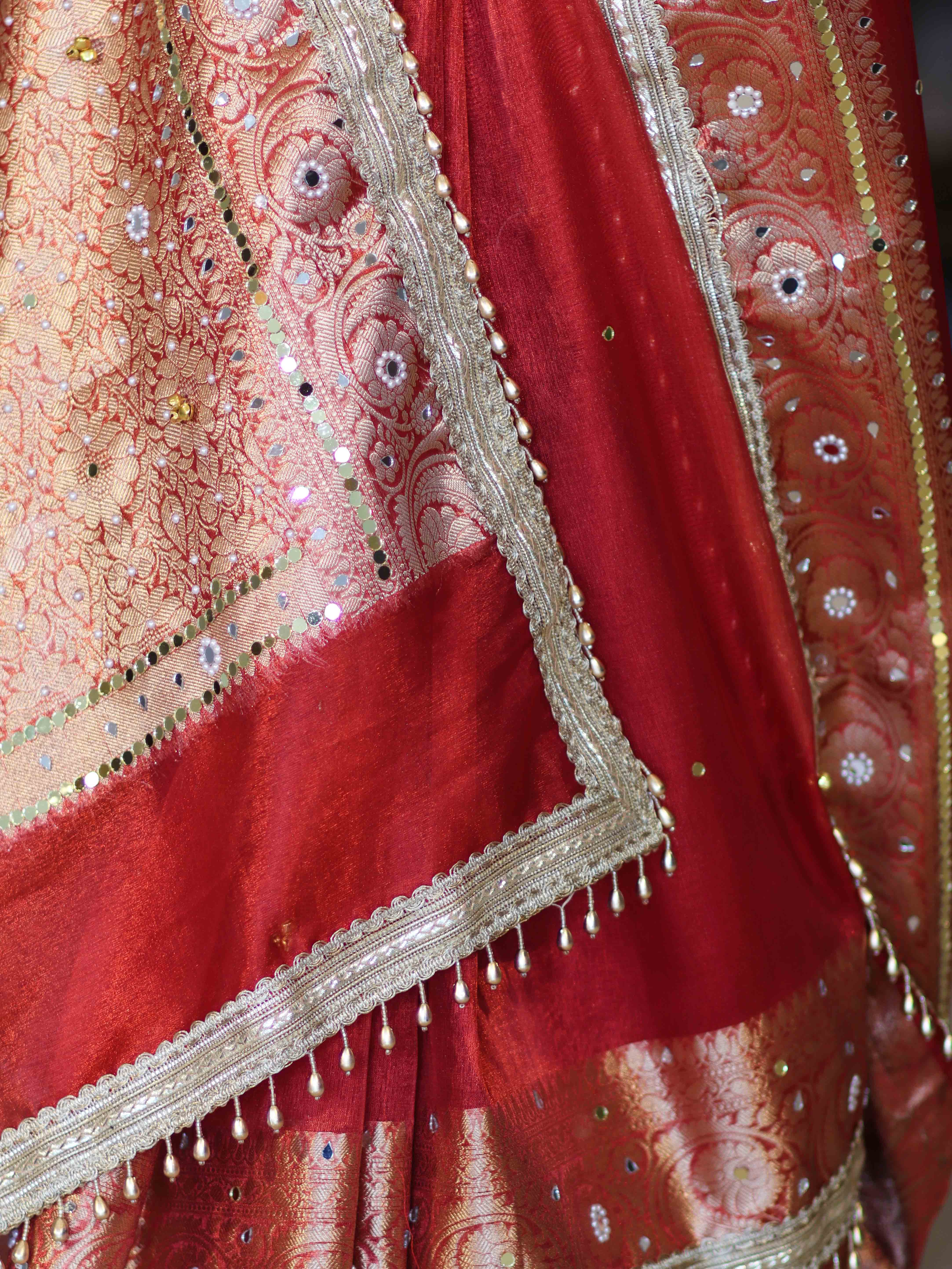 Banarasee Tissue Saree With Hand Embroidered Mirror Work Ghungroo Work & Zari Woven Pallu-Red