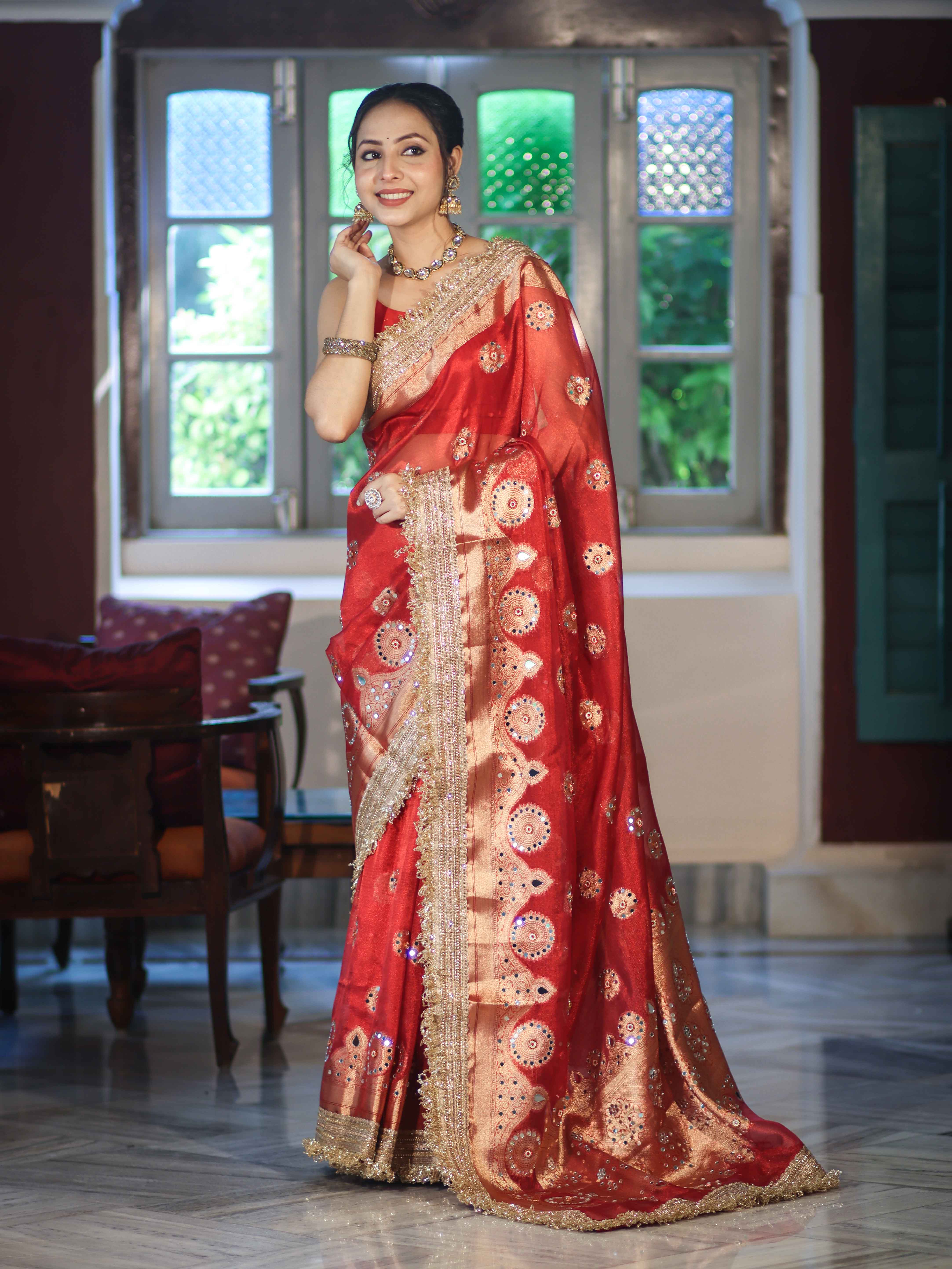 Banarasee Tissue Saree With Hand Embroidered Mirror Work Pearl Motifs & Zari Woven Pallu-Red