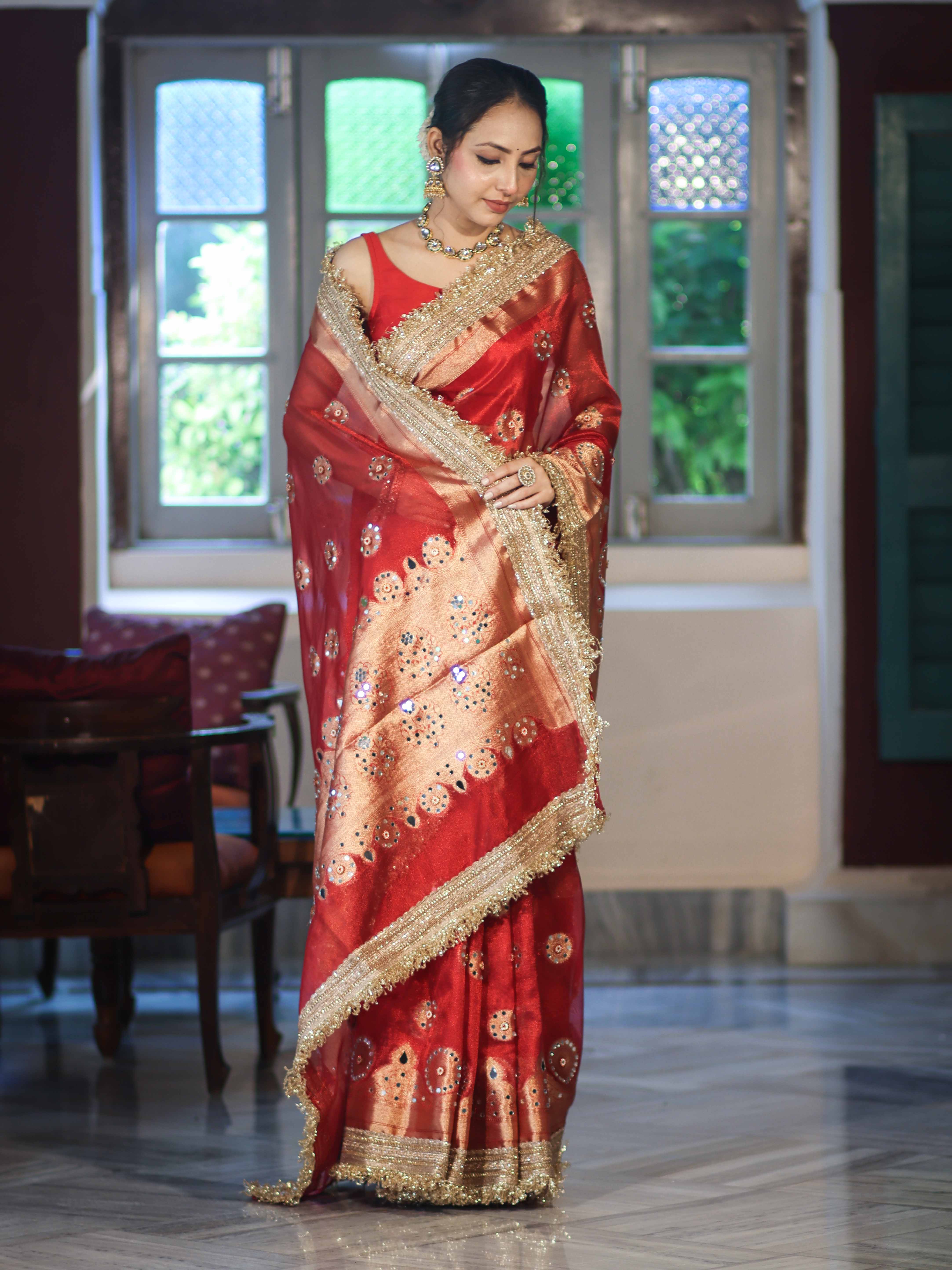 Banarasee Tissue Saree With Hand Embroidered Mirror Work Pearl Motifs & Zari Woven Pallu-Red