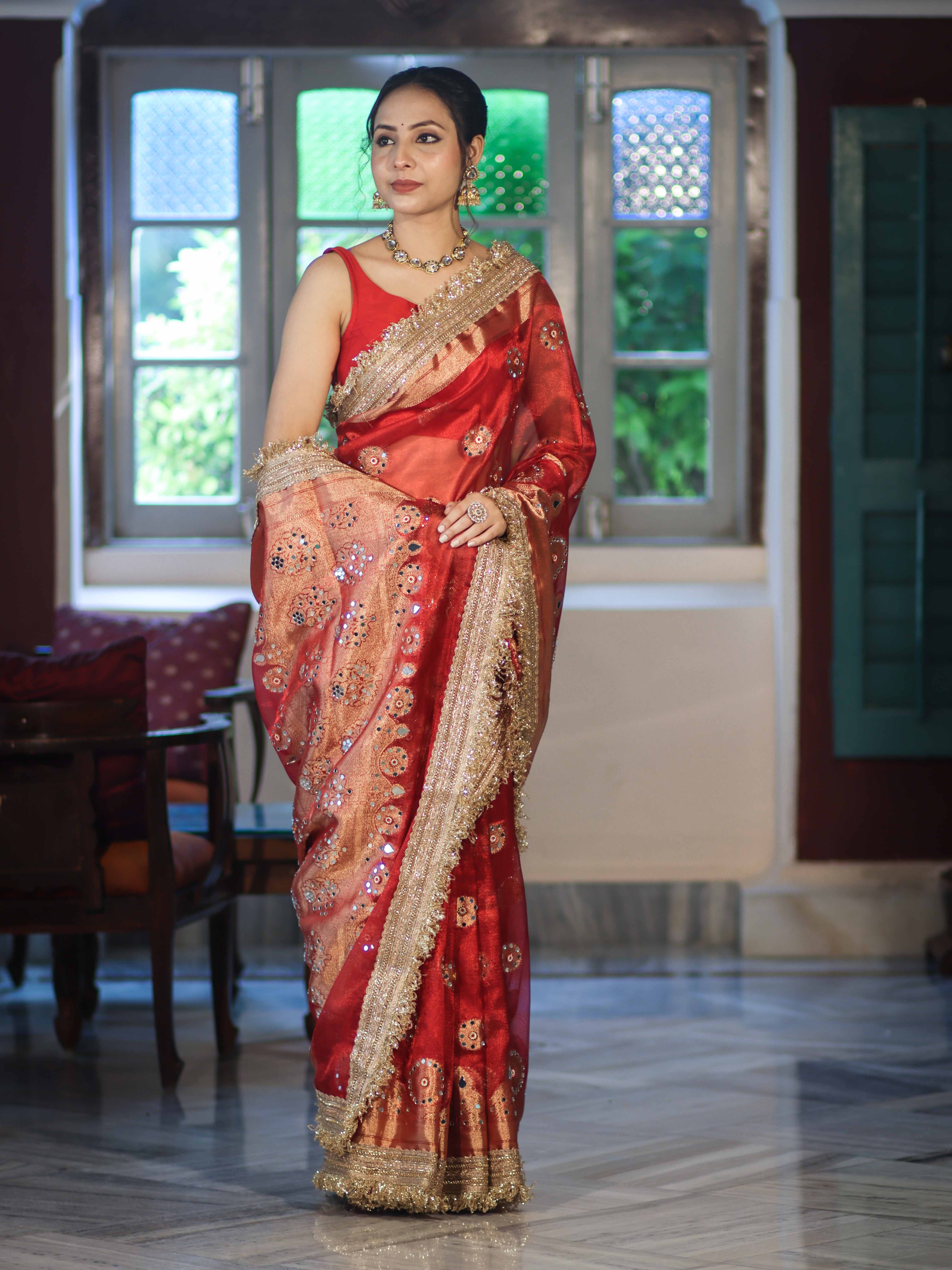 Banarasee Tissue Saree With Hand Embroidered Mirror Work Pearl Motifs & Zari Woven Pallu-Red