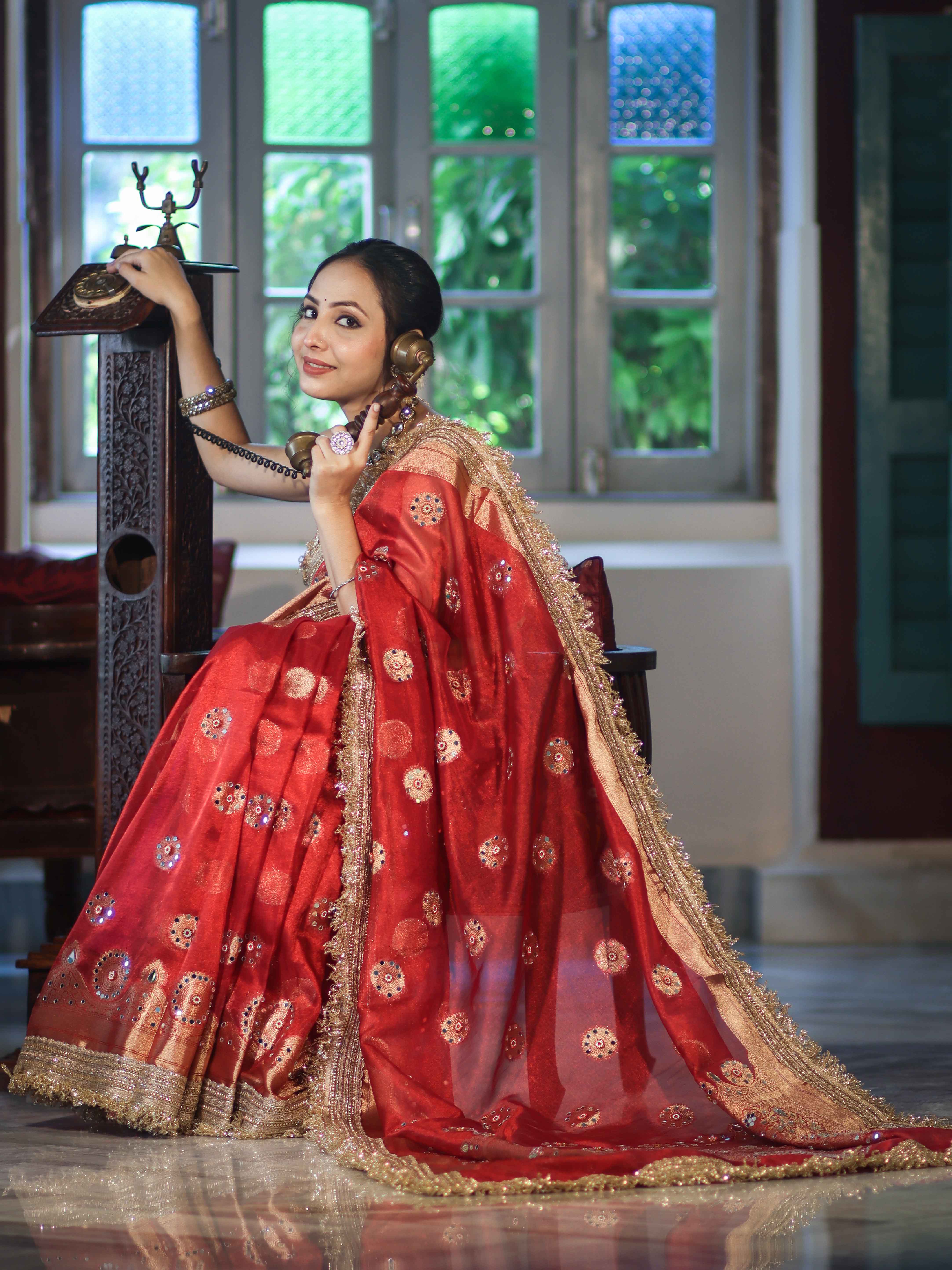 Banarasee Tissue Saree With Hand Embroidered Mirror Work Pearl Motifs & Zari Woven Pallu-Red