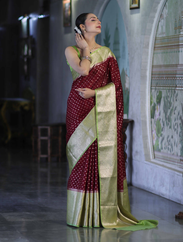 Banarasee Semi Chiffon Saree With Buti Design & Contrast Zari Border-Deep Maroon & Light Green
