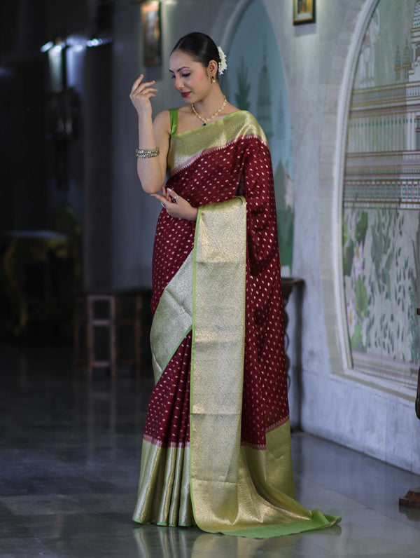 Banarasee Semi Chiffon Saree With Buti Design & Contrast Zari Border-Deep Maroon & Light Green