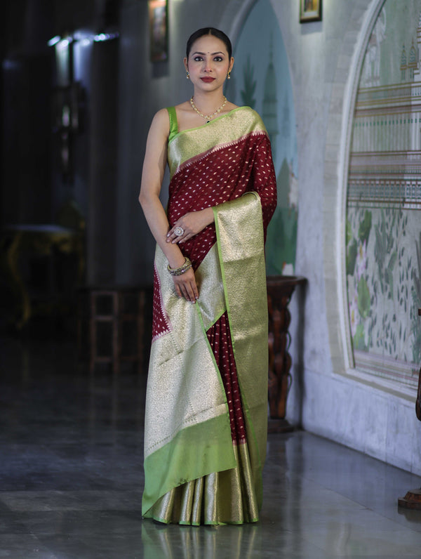 Banarasee Semi Chiffon Saree With Buti Design & Contrast Zari Border-Deep Maroon & Light Green