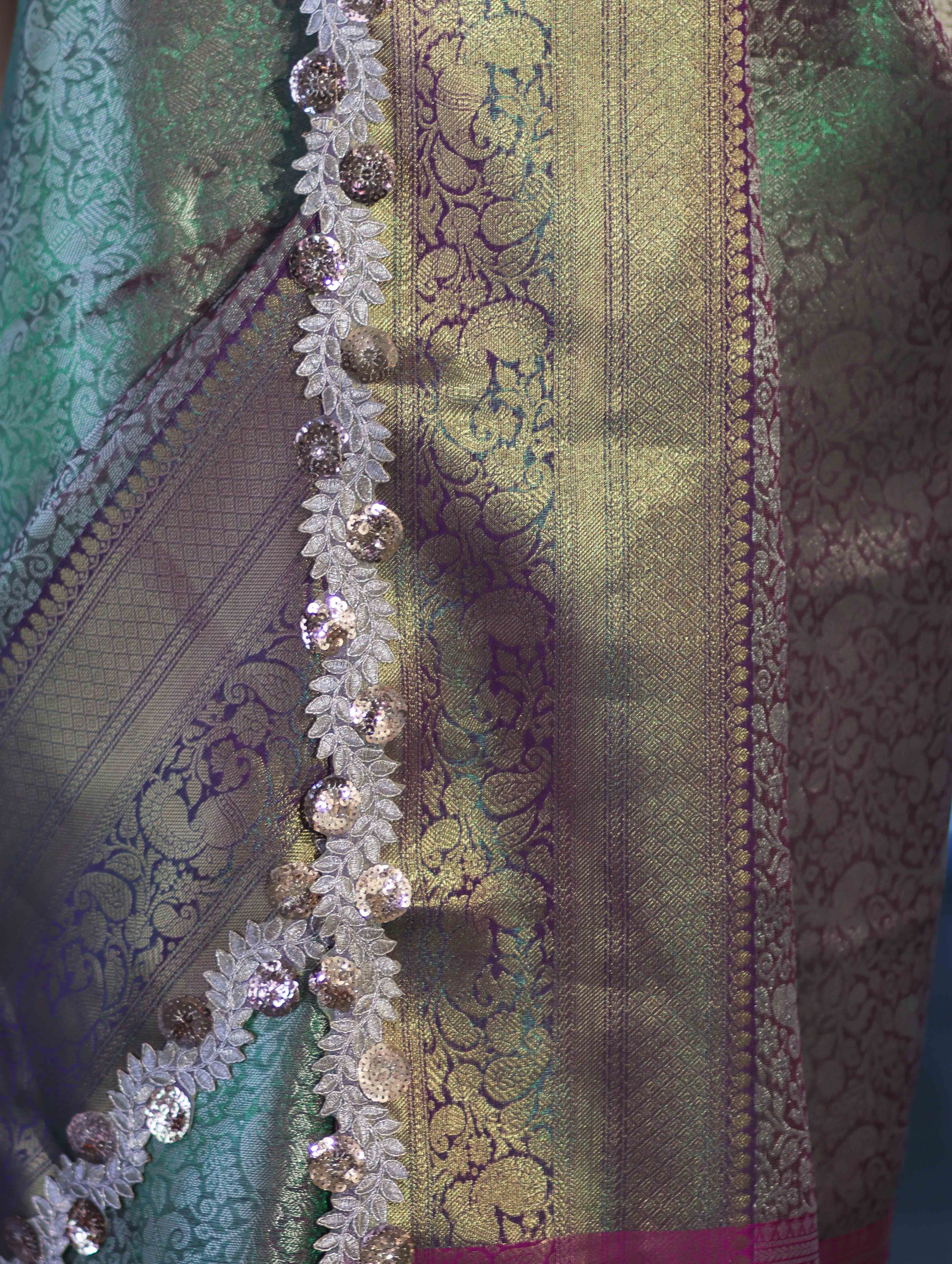 Banarasee Handloom Dual Tone Tissue Saree With Zari Weaving Floral Work & Lace Border-Green & Violet