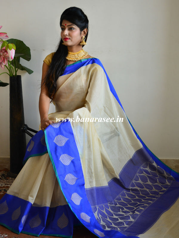 Banarasee Pure Soft Cotton Saree With Blue Leaf Motif Border- Off-White