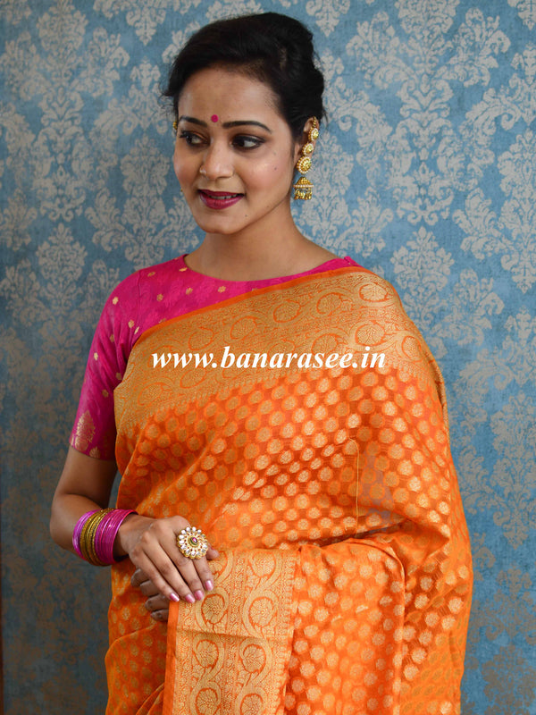 Banarasee Handwoven Semi-Chiffon Saree With Floral Border & Buta-Orange