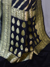 Banarasee Faux Georgette Saree With Zari Stripes Design & Floral Border-Black