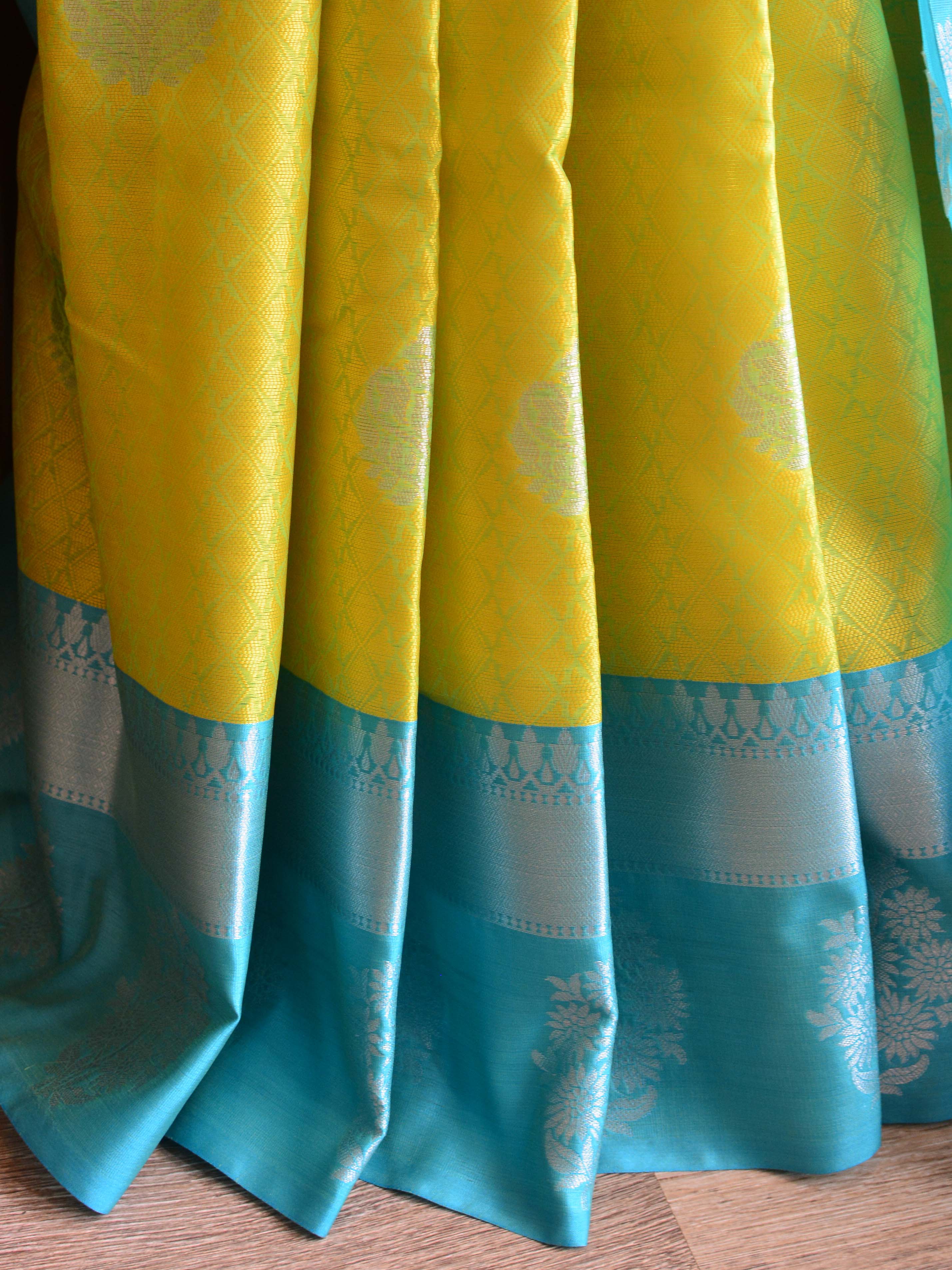 Banarasee Kora Muslin Saree With Silver Zari Tanchoi Design & Skirt Border-Yellow