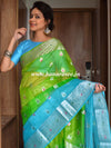 Banarasee Organza Mix Saree With Silver Zari Buta & Dual Color Design-Green & Blue
