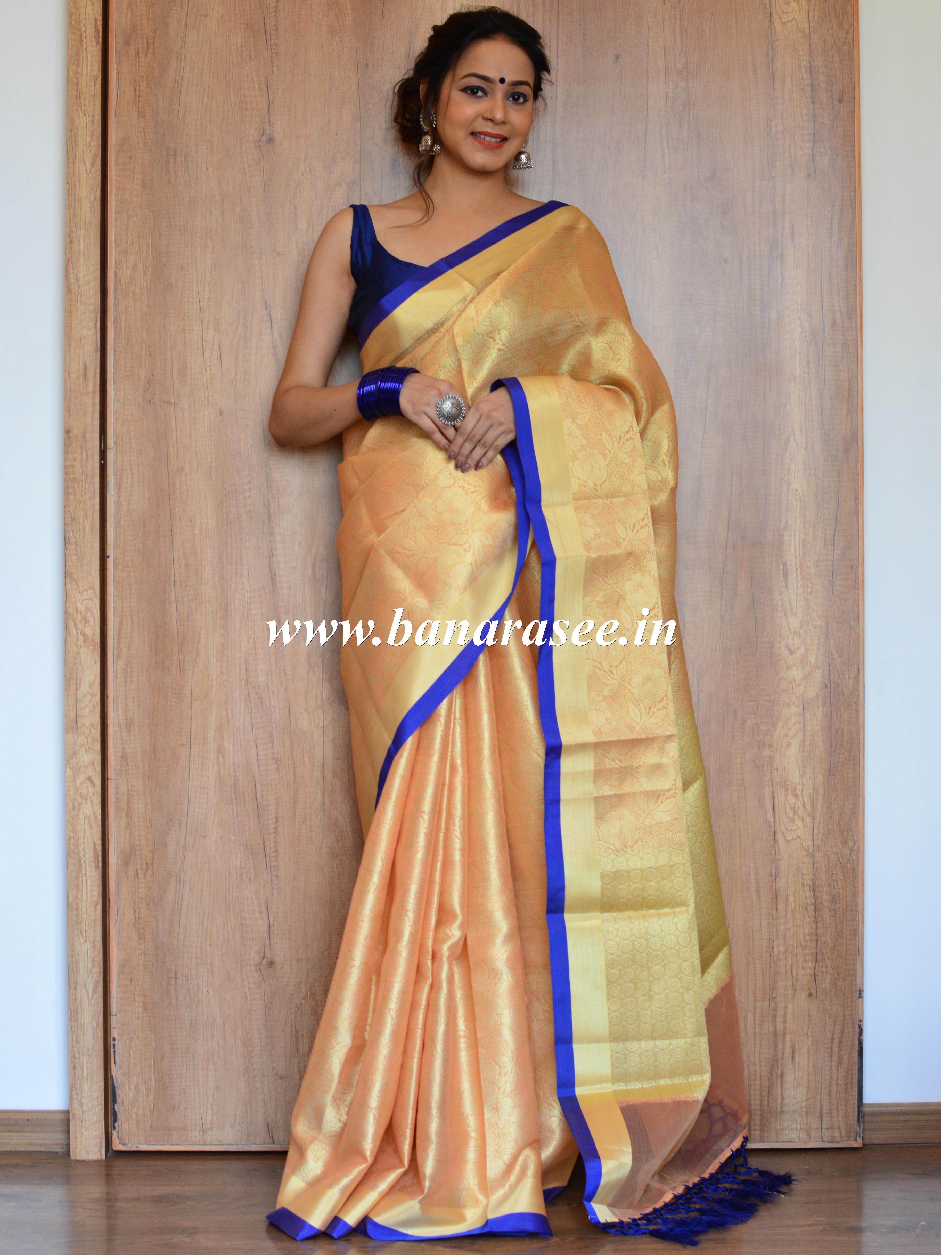 Banarasee Kora Muslin Saree With Tanchoi Design & Blue Border-Peach